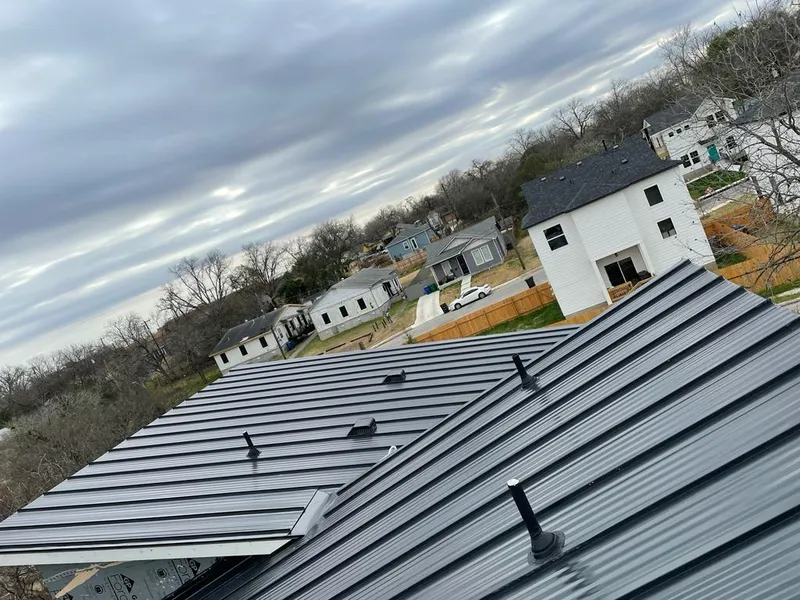 Standing seam metal roof panels with vents for Skylight Repair in Quincy
